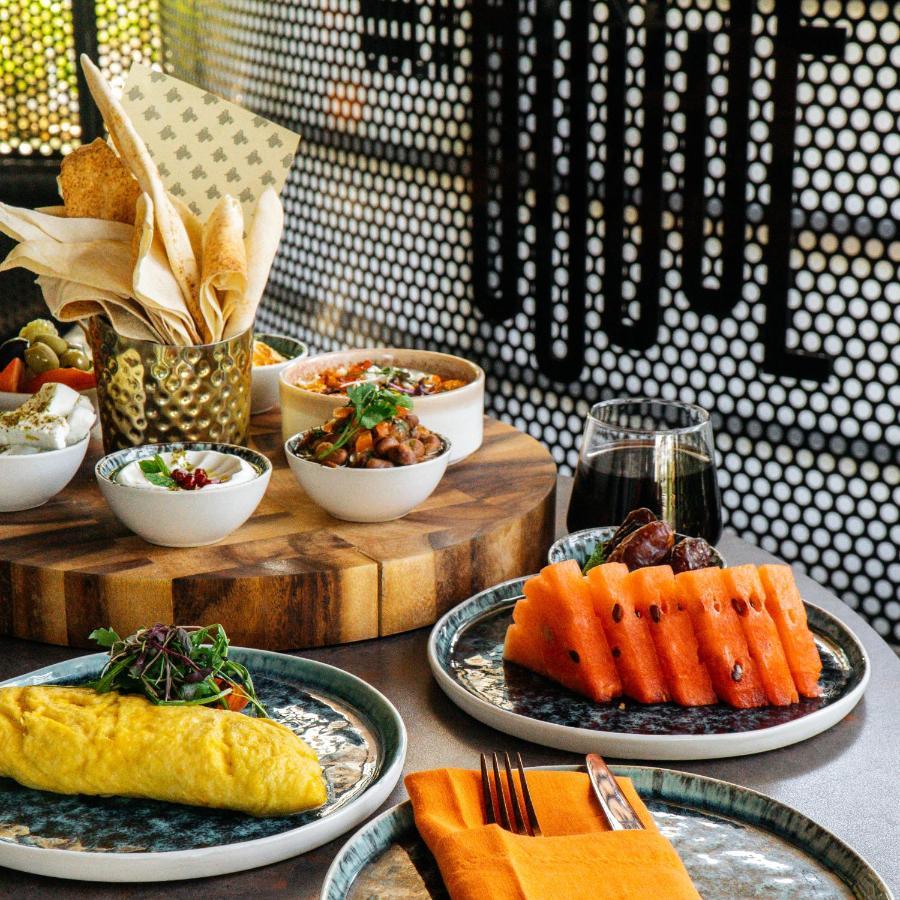 Somerset West Bay Doha Exterior photo A selection of dishes at the restaurant