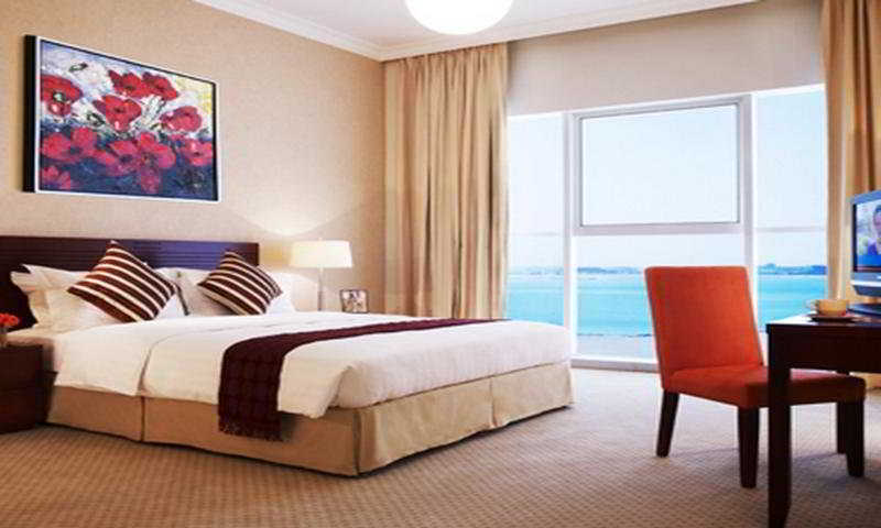 Somerset West Bay Doha Exterior photo A bedroom at the hotel